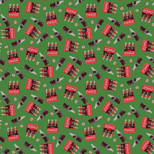 Coca-Cola Christmas Tossed Crate Green – Remnant 36″ × 44″ - Northcott from Fort Worth Fabric Studio